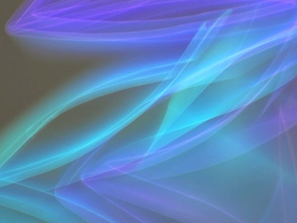 Blue glowing abstract waves symbolizing energy and tranquility